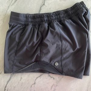 Black 4 inch hotty hot shorts. Mid rise.